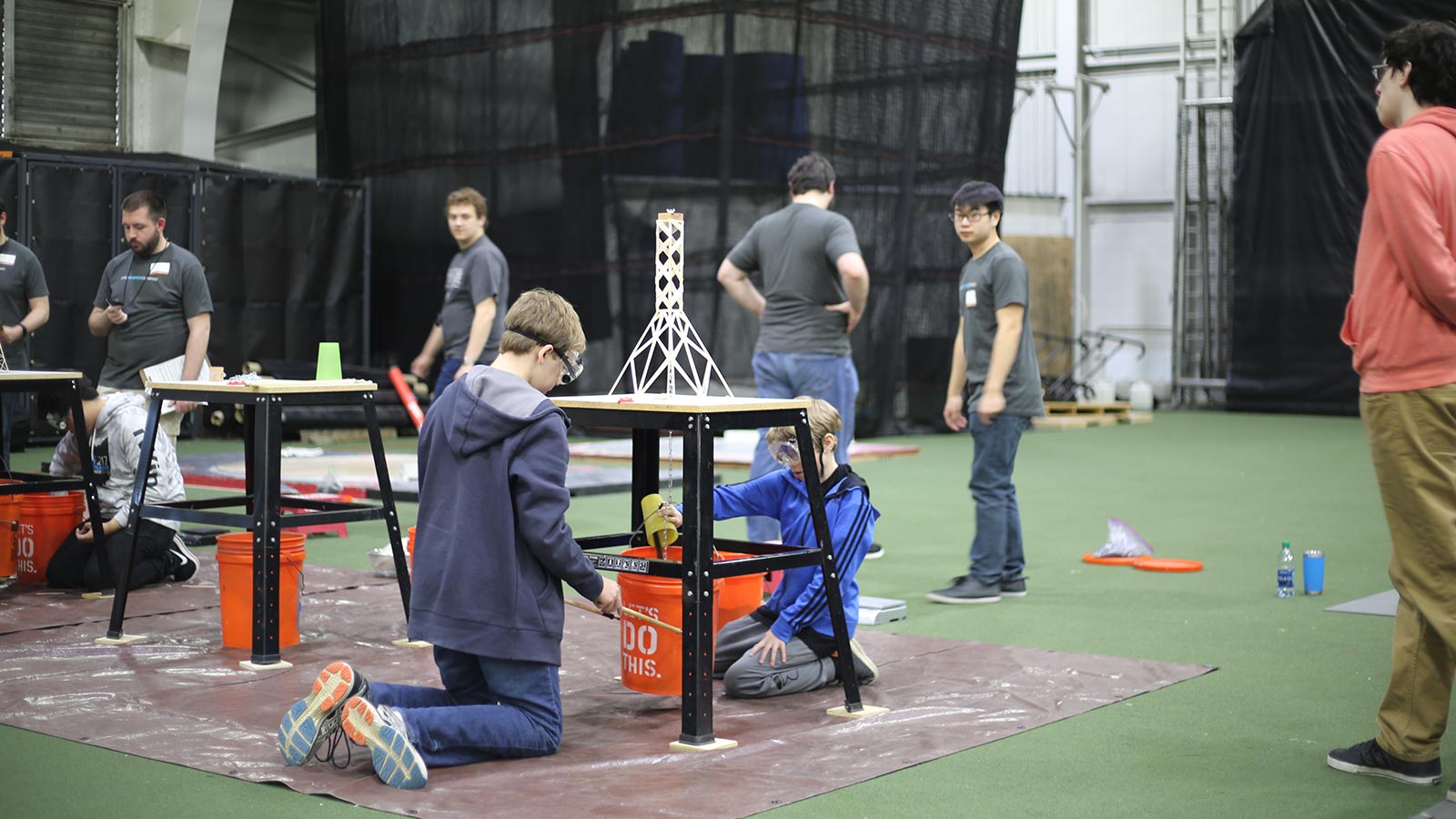 Science olympiad participants competing in an event