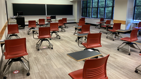 Desks and chairs in an Ohio State classroom spaced out for physical distancing