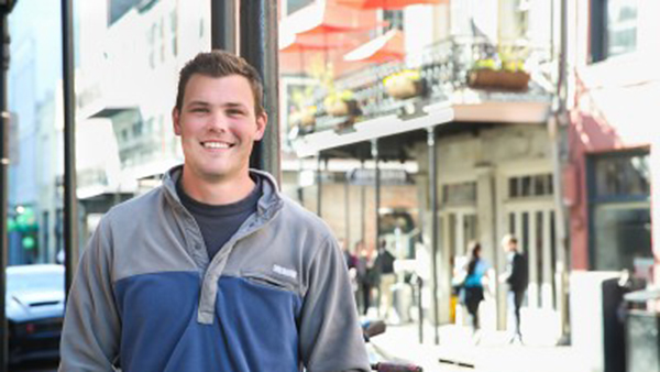 Student George Bevan stands on a street in the French Quarter of New Orleans