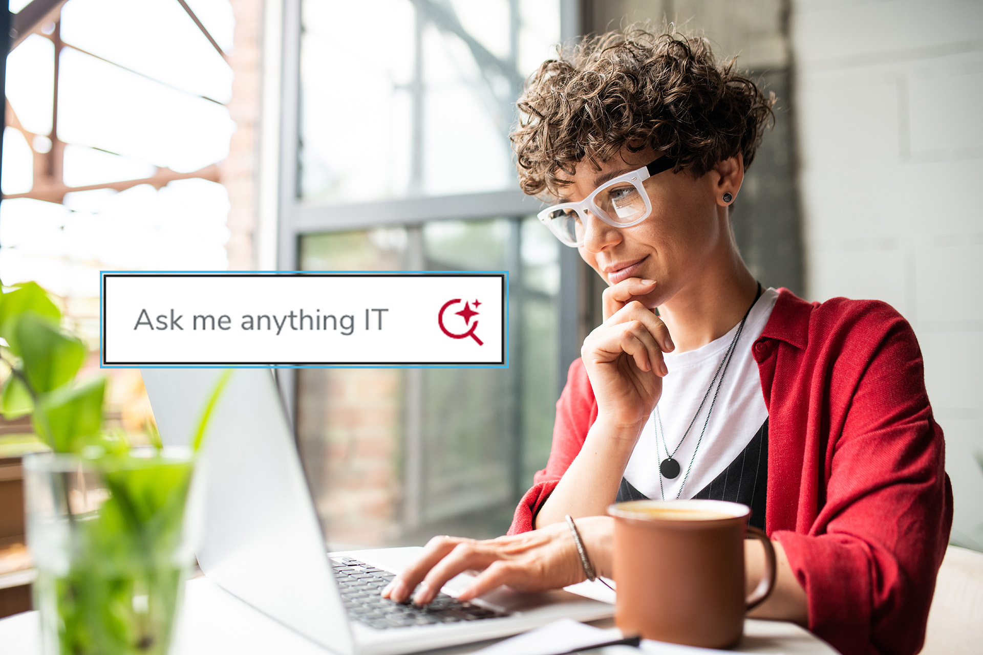 Woman working on a laptop with one hand on her chin as if she's thinking