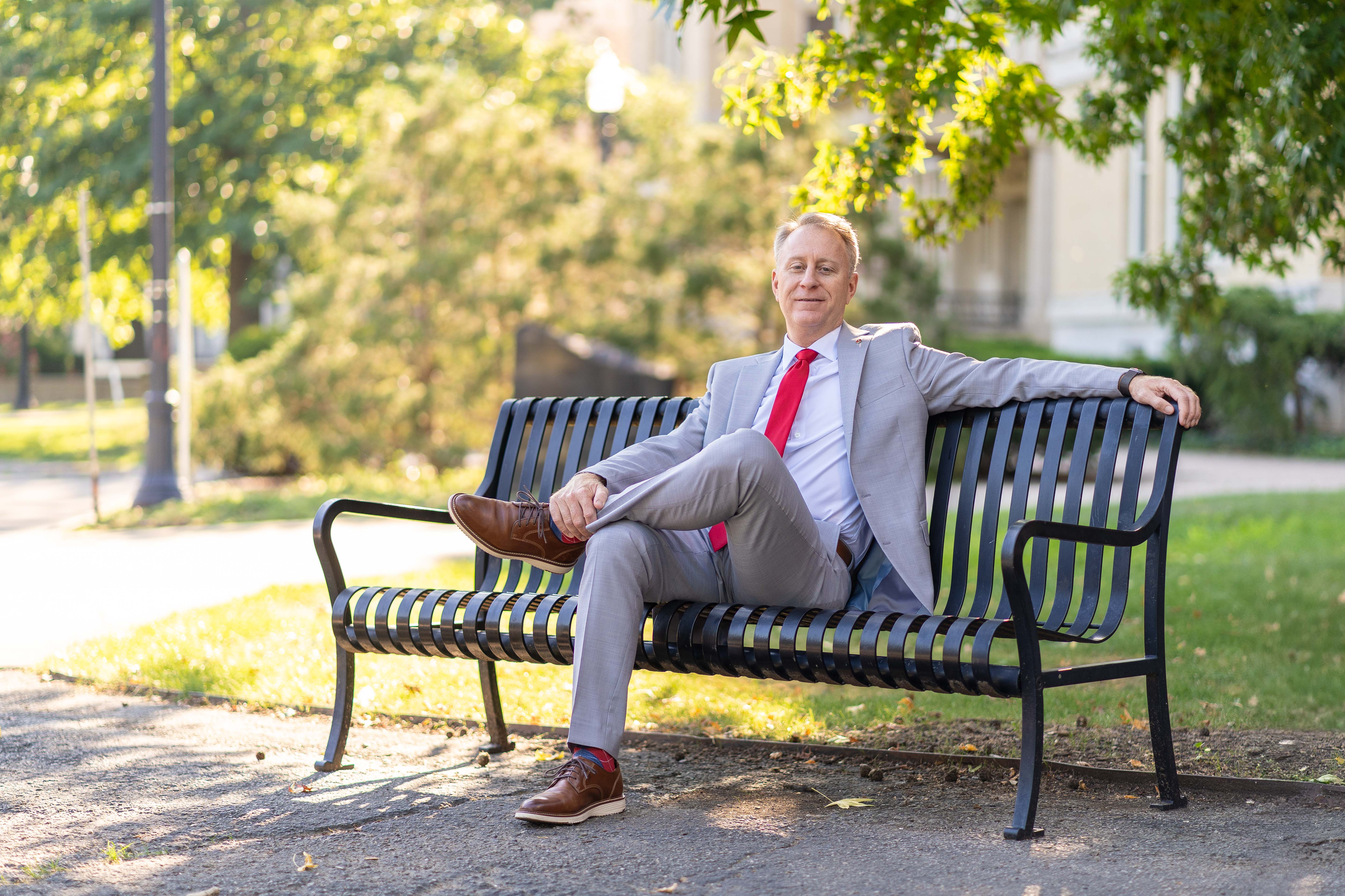 Rob Lowden sitting on a bench.