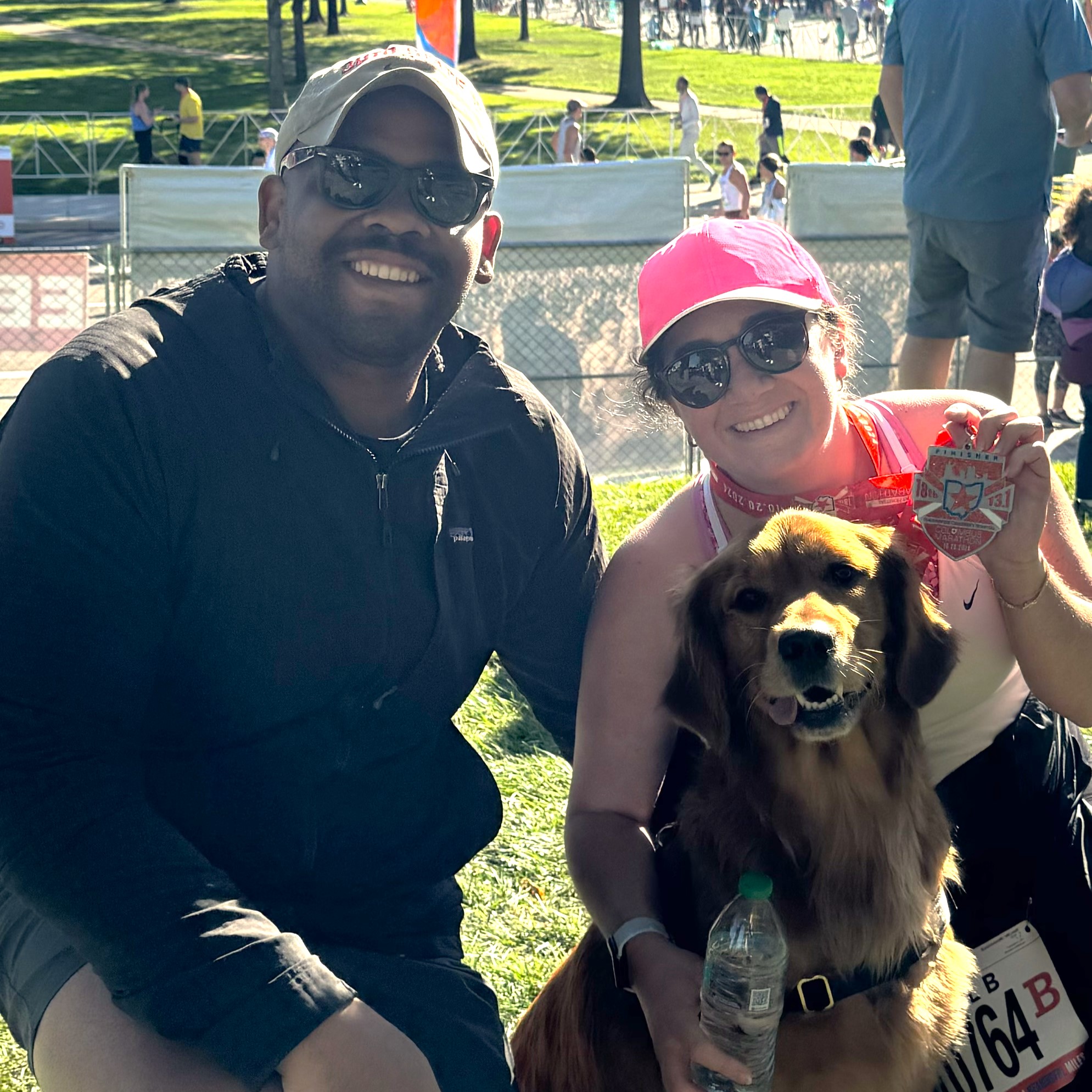 Drarelle with his wife Melanie and their golden retriever Lincoln
