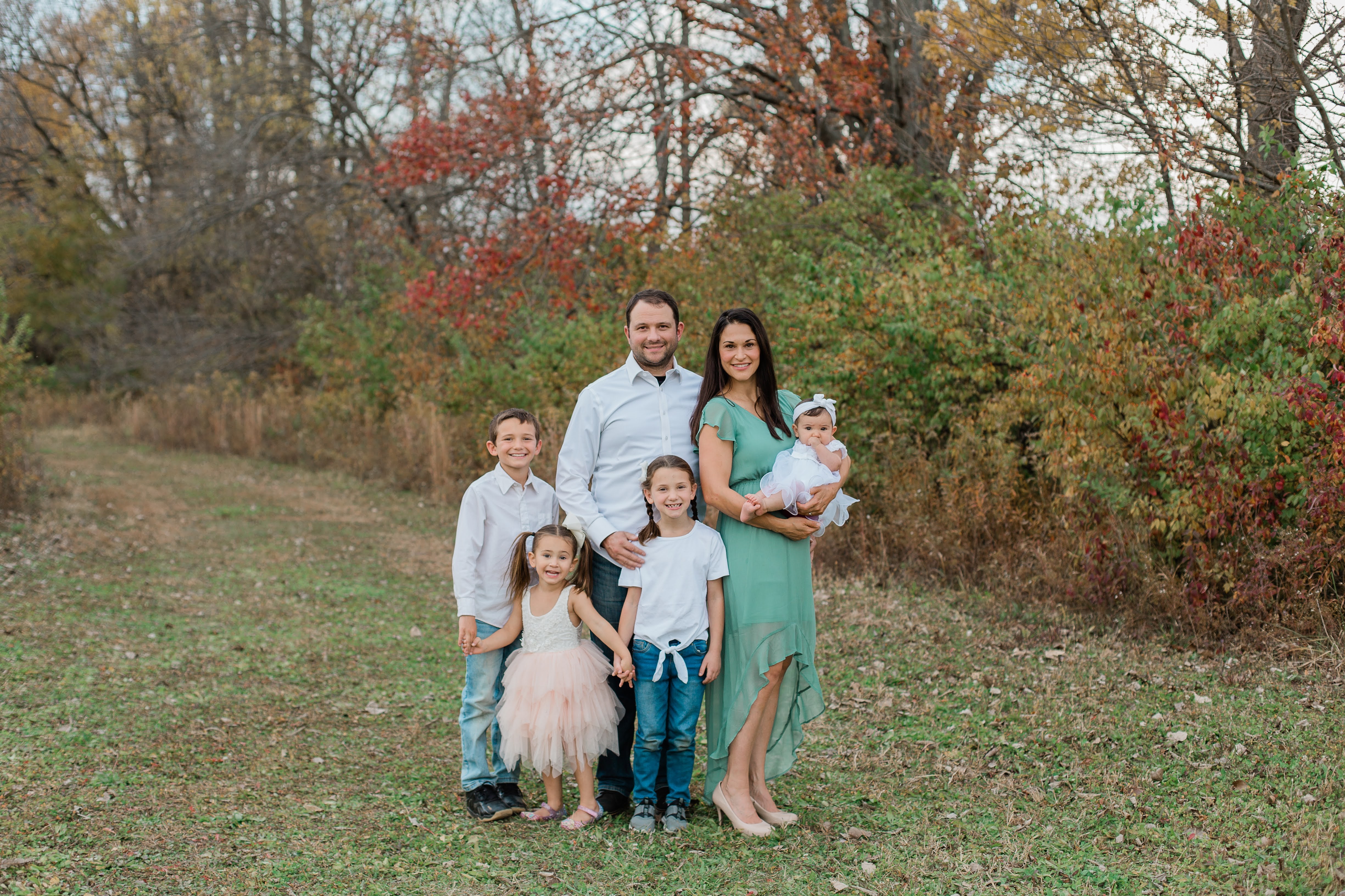 Dietrich and wife Tamara pose with their four children.