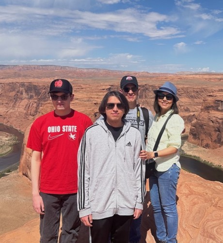 Israt with her two sons and husband at the Grand Canyon.