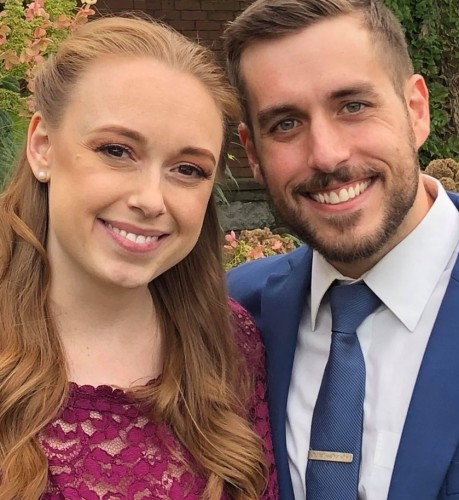 Jordan and his wife are all dressed up and all smiles