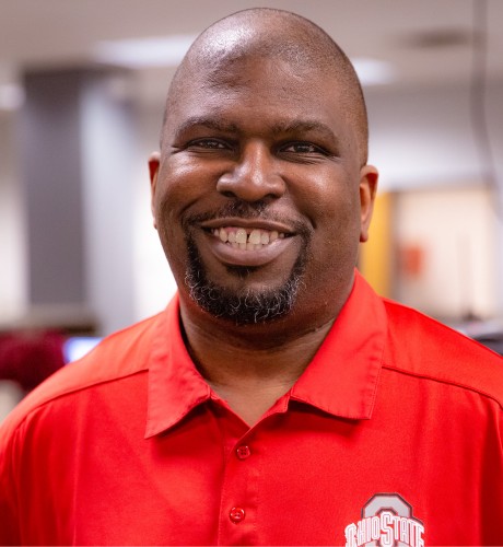 Mario smiles for the camera, donning a red Ohio State polo