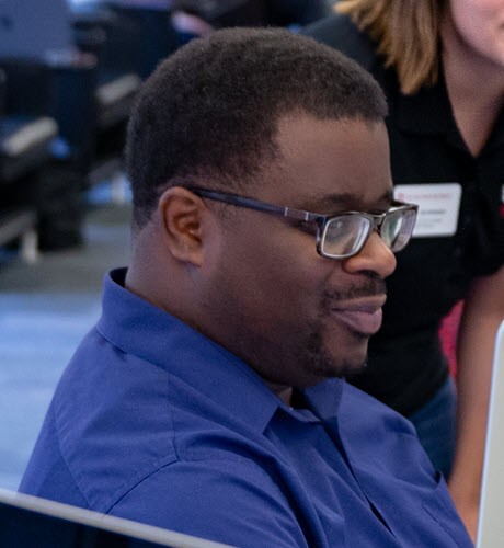 Marvin looks focused, as he volunteers at an event on campus