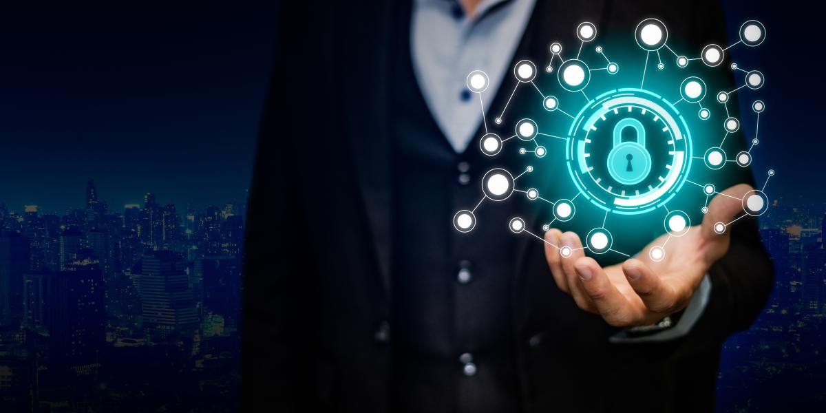 decorative image of a man holding cybersecurity device
