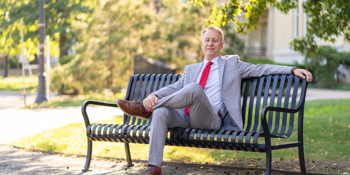 Rob Lowden sitting on a bench.