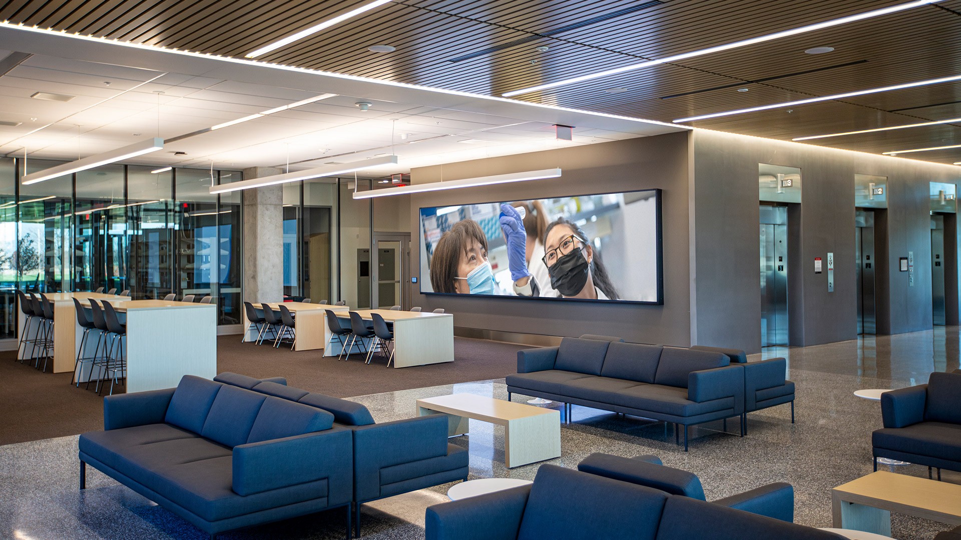 Research Center lobby with giant screen