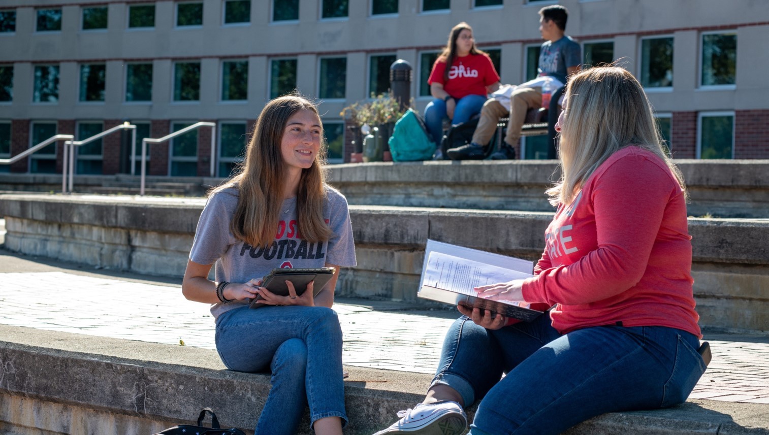 students using wifi with laptop outside