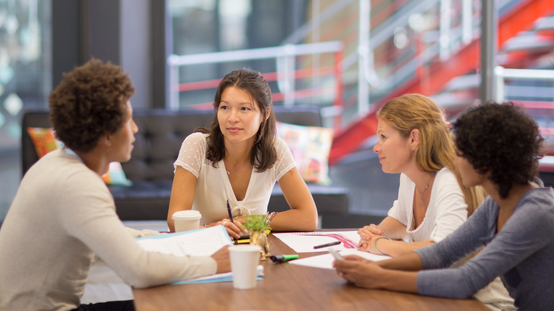 Group of people meeting around a table