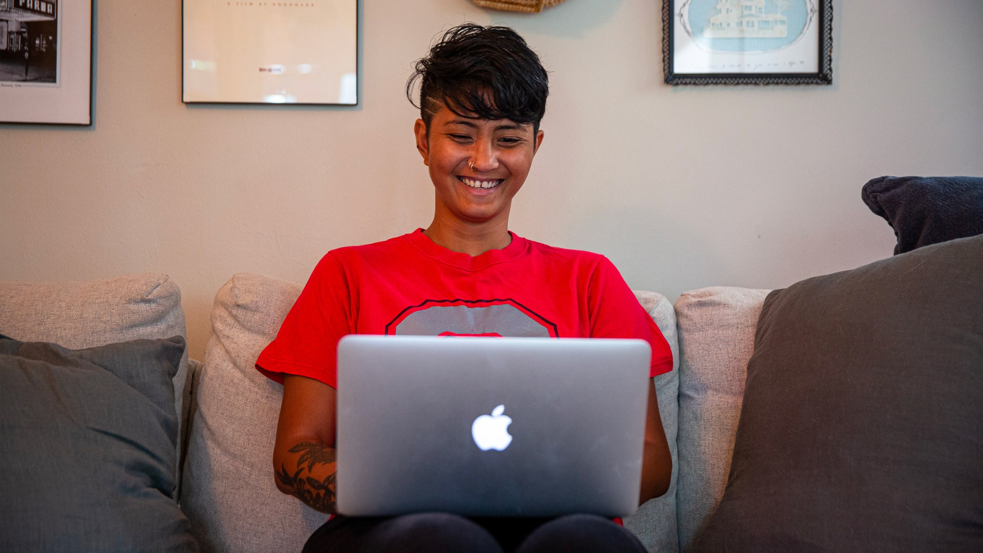 Ohio State student using laptop at home