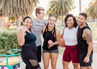  Happy Diverse Group of Athletes Embracing Outdoors