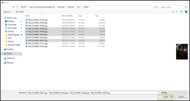 File Explorer open with multiple images selected to be uploaded