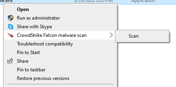 Scan menu option selected to run a CrowdStrike manual scan of the device