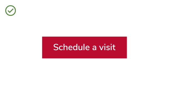 An accessible scarlet button with white text showing sufficient contrast