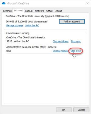 OneDrive settings window open to account tab with Stop Sync highlighted