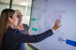 woman instructing using map image