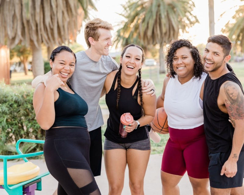  Happy Diverse Group of Athletes Embracing Outdoors